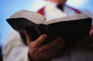 Pastor Holding Bible